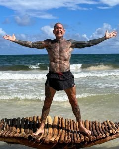 Evan Seinfeld on the beach